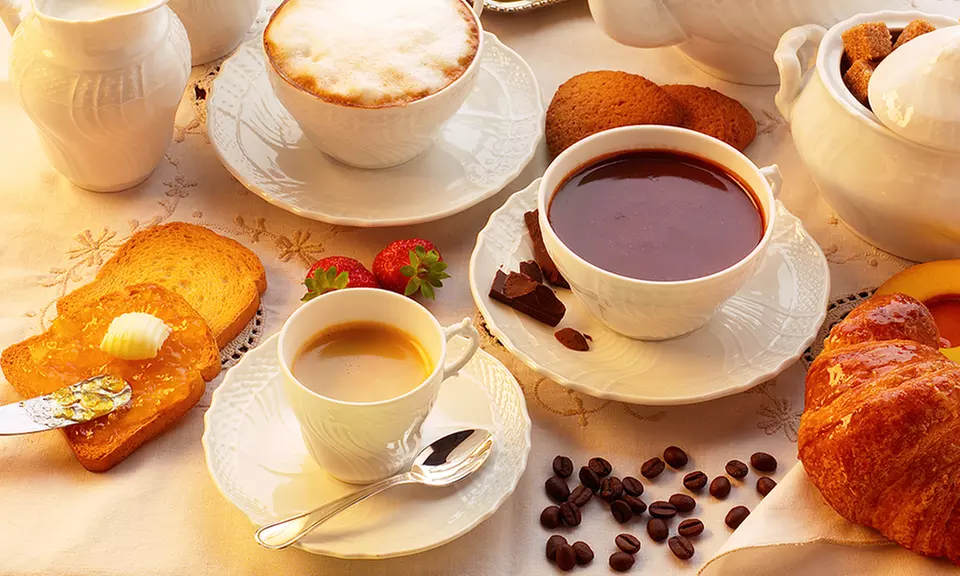 Get $10 Towards Coffee, Tea, & Beverages or $25 Worth of Drinks & Food at Lady and the Mug (Up to 46% Off) - Primary Image