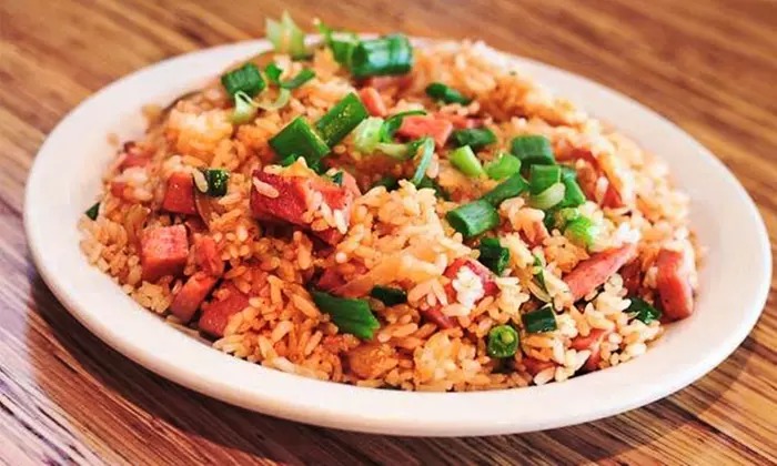 Two or Three Groupons, Each Good for $16 Worth of Guamanian Cuisine and Drinks at Guahan Grill (Half Off) - Primary Image