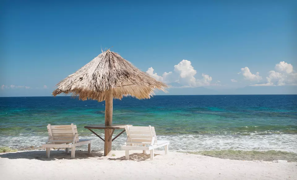 Seven-Night Stay for Two with Charter Flight and All Meals at Utopia Village in Honduras. Three Options Available. - Primary Image