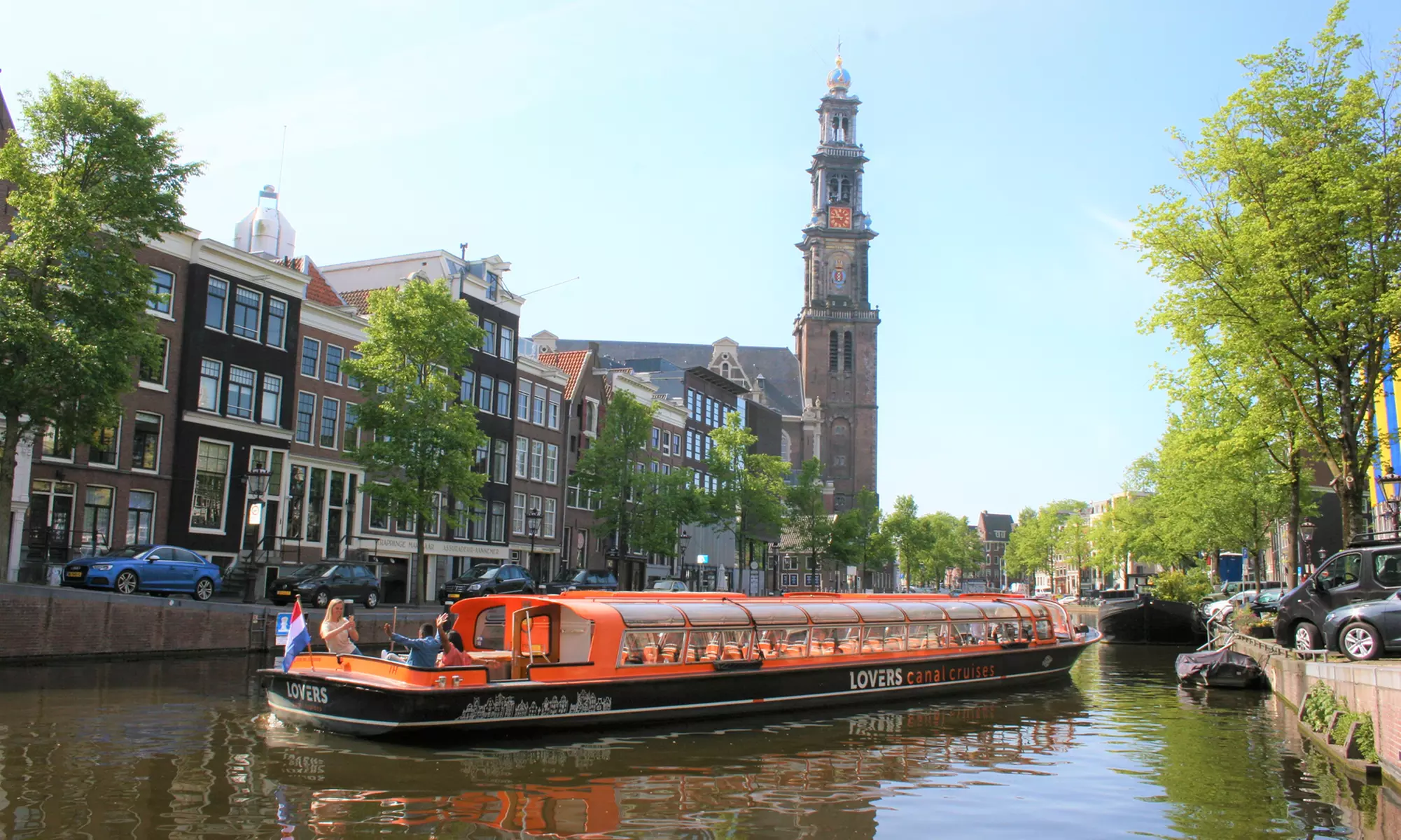 Erkunde tagsüber oder abends die ikonischen Grachten von Amsterdam