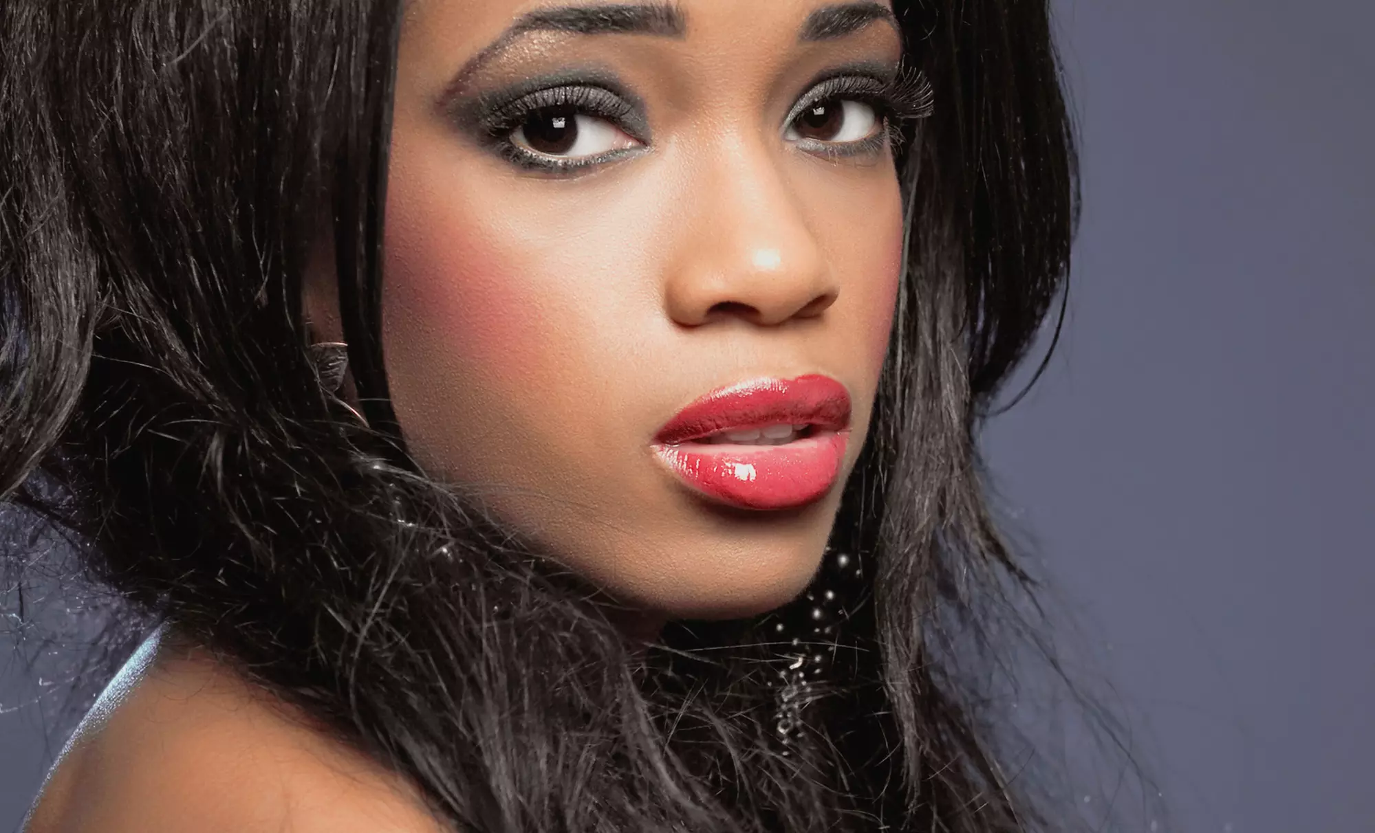 Full Sew-In Extensions or Relaxer Treatment at Salon 127 (Up to 53% Off) - Primary Image