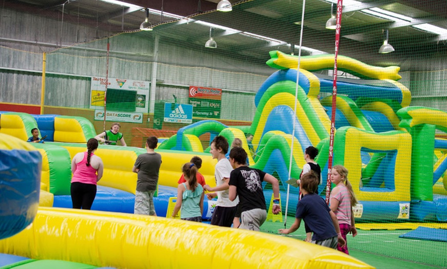 Image 3: Slide, Jump, Laugh—Unleash Your Inner Child at Inflatable World!