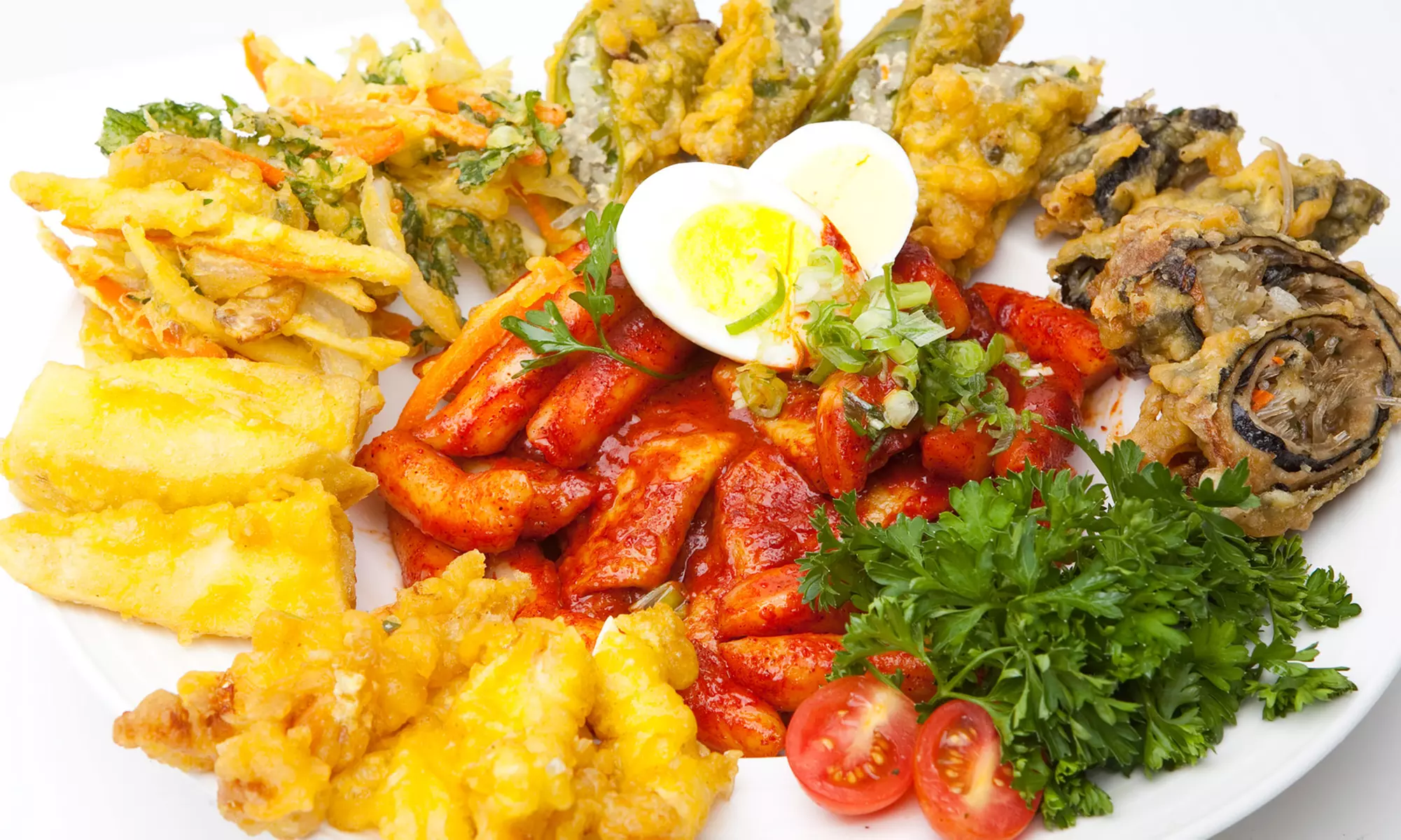 Korean Meal with Salads and Family-Style Dumplings and Chicken for Two or Four at Red Holic (Up to 52% Off) - Primary Image