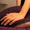 Image 3: One, Three or Five Hot Stone Massage and Back Facial Treatments