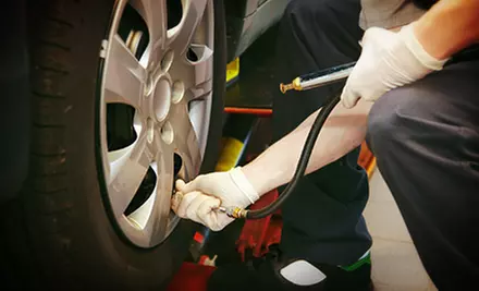 Service Package with Tire Rotation and Regular or Synthetic Oil Change at Cassidy Tire & Service (Up to 64% Off) - Primary Image