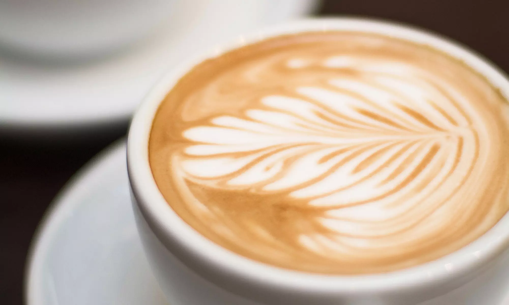 $15.75 for Three vouchers, Each Valid for $10 Worth of Coffee and Snacks at White Rhino Coffee ($30 Total Value) - Primary Image