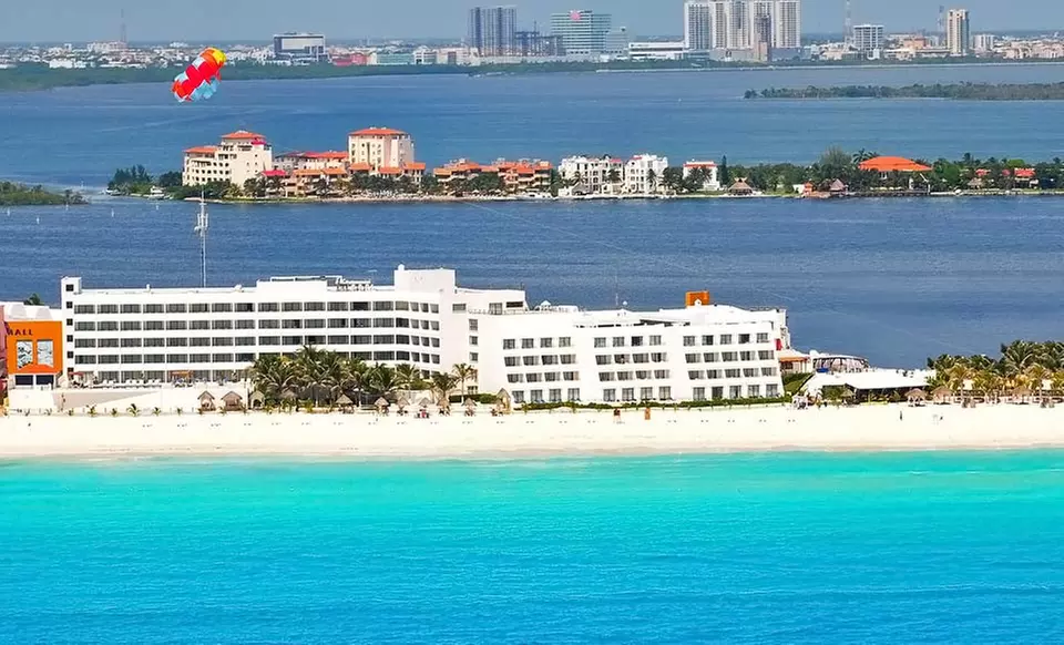 ✈ Flamingo Cancun Stay with Airfare. Includes Taxes and Fees. Price per Person Based on Double Occupancy. - Primary Image