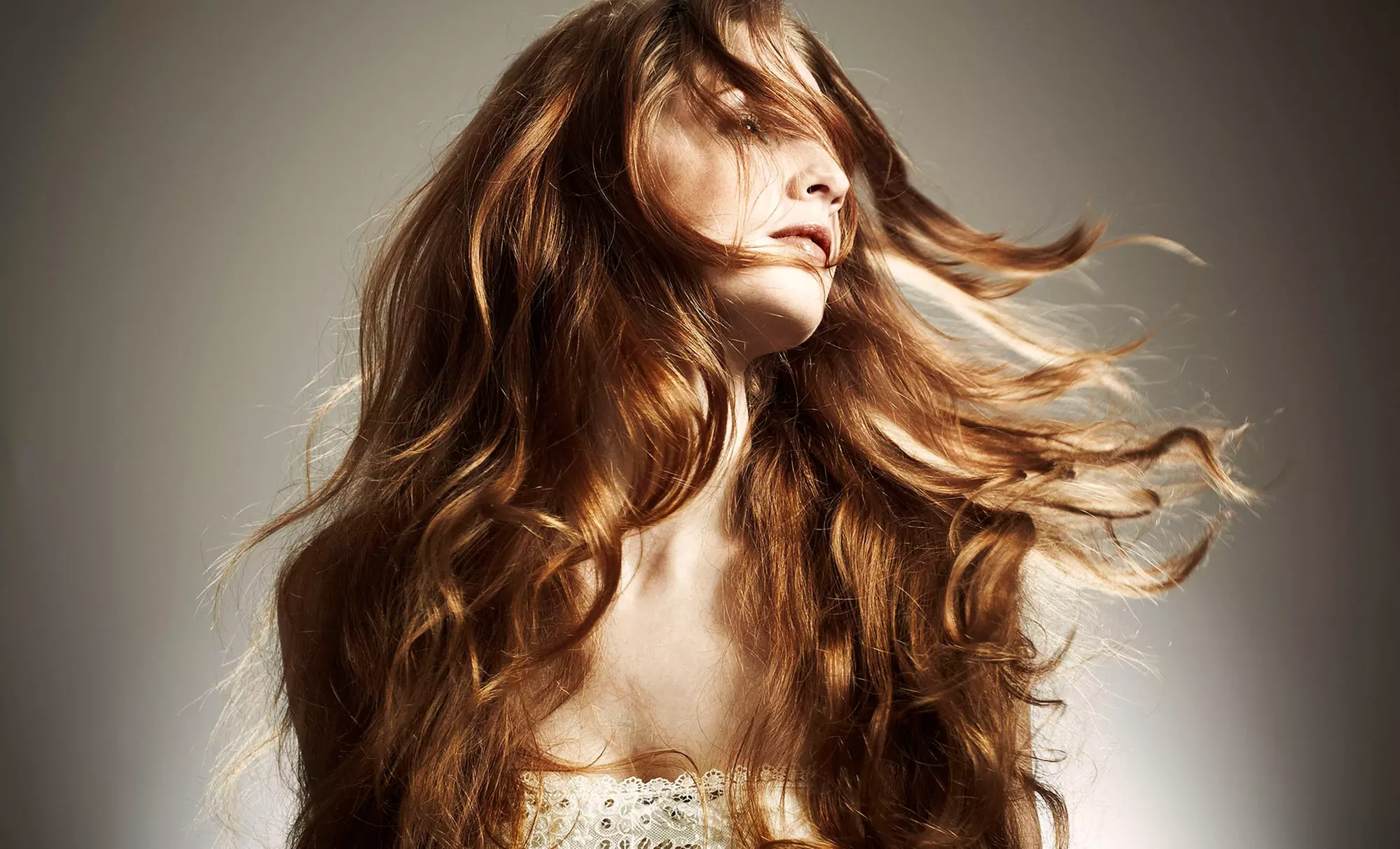 One, Three, or Six Conditioning Treatments and Blowouts at Salon Elle (Up to 64% Off) - Primary Image