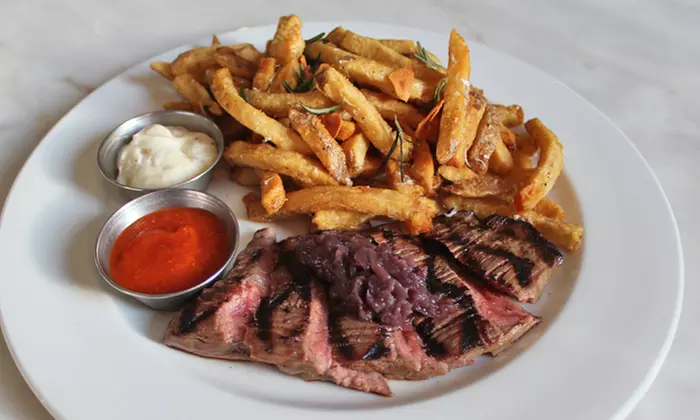 Four-Course Bistro-Style Meal with Wine for Two or Four at Samuel J. Moore (Up to ﻿46% ﻿Off﻿) - Primary Image