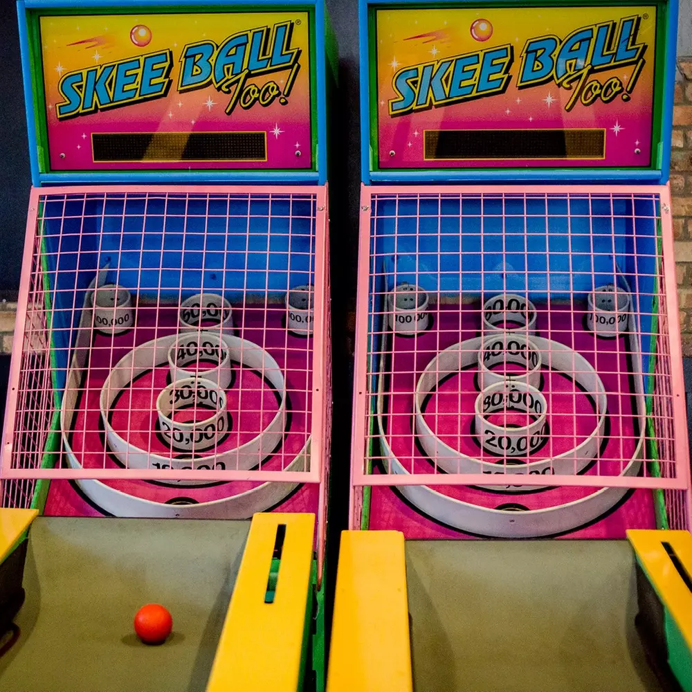 One, Two, or Four Game-Play Wristbands, or Arcade Food for Takeout or Dine-In at Draftcade (Up to 50% Off) - Primary Image