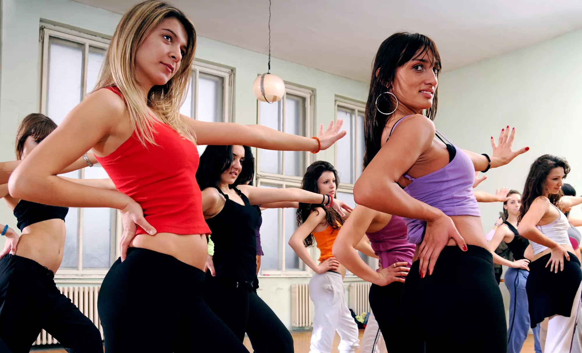 10 or 20 Yoga or Zumba Classes at Bryan's Fitness Inferno (Up to 51% Off) - Primary Image