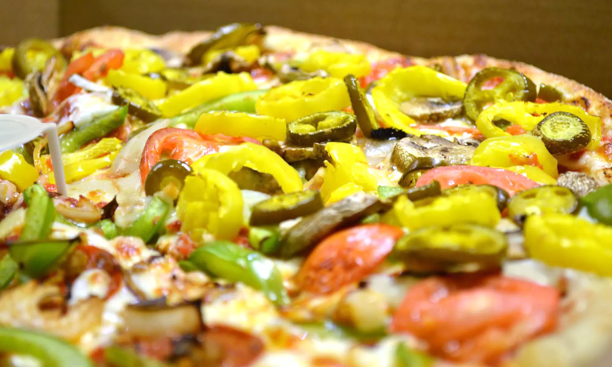 $12 for Two Groupons, Each Good for $10 Worth of Food at Panoony's Pizza and Wings ($20 Total Value) - Primary Image
