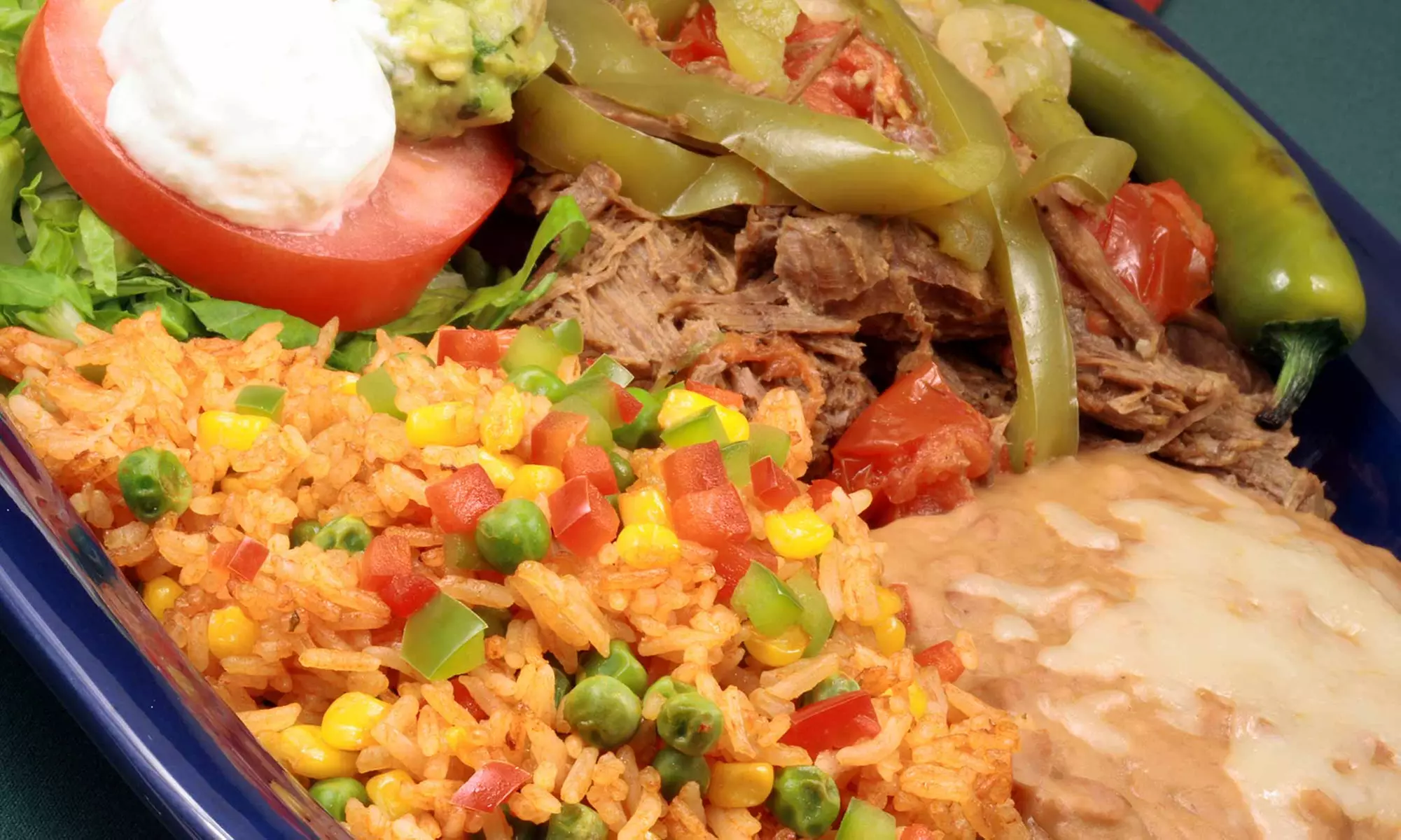 Latin American Food at Tex-Chick Puertorrican Restaurant (Up to 43% Off). Two Options Available. - Primary Image