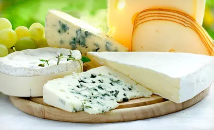 Cheese Package with Brie, Cheddar, and Goat Cheese or Cheese and Ham Package at Cheese Emporium (Up to 53% Off) - Primary Image