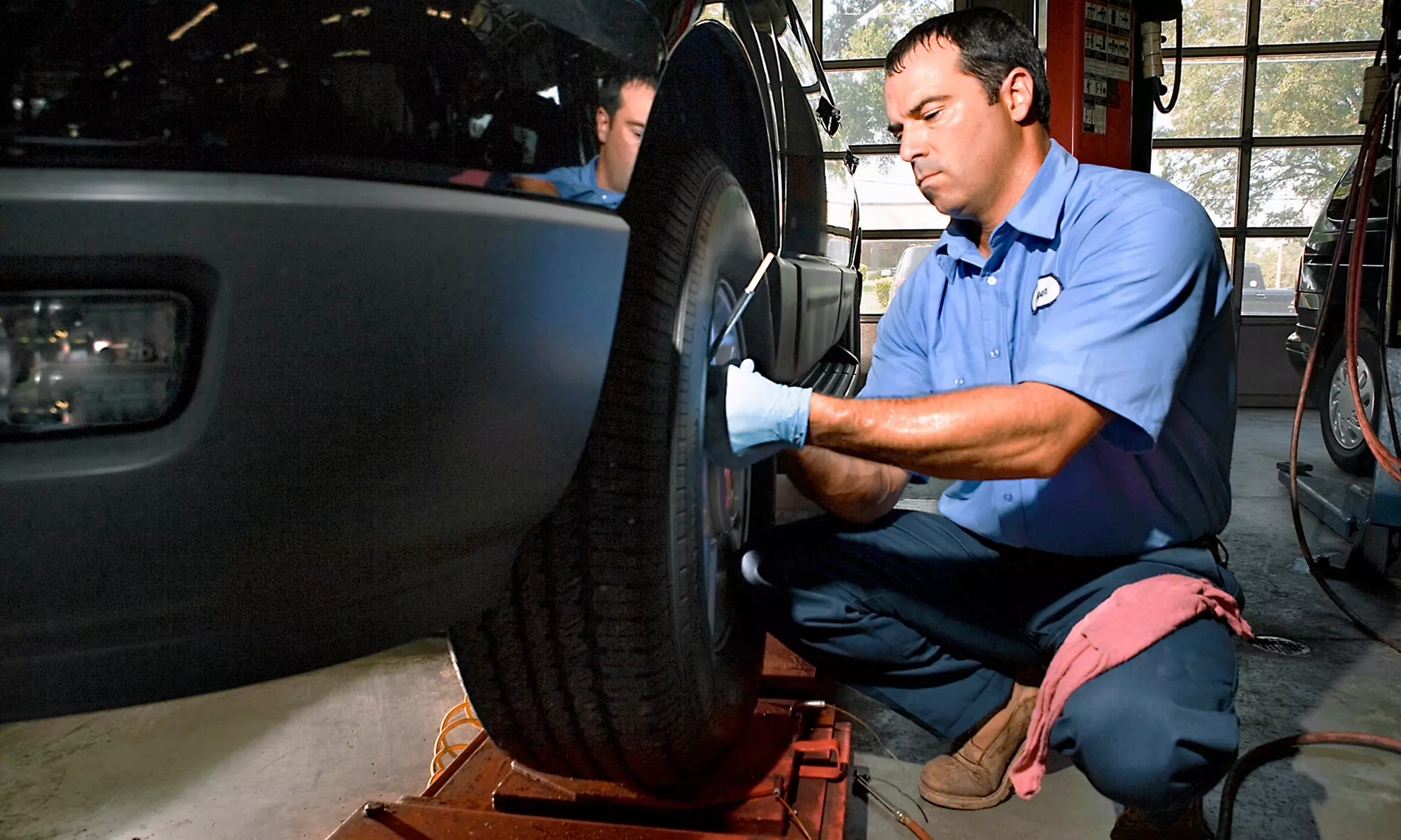 Oil Change and Tire Rotation, Winterization Package, or Transmission Flush at K&R Automotive (Up to 60% Off) - Primary Image