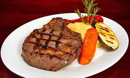 $75 for a Four-Course Dinner for Two at Wildfire Steakhouse & Wine Bar (Up to $161.80 Value) - Primary Image