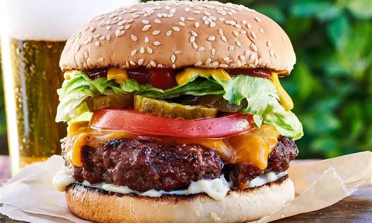 One ($9.90), Two ($19.80) or Four Burgers with Regular Fries Each ($39) at Brown Cow Burgers (Up to $67.60 Value) - Primary Image