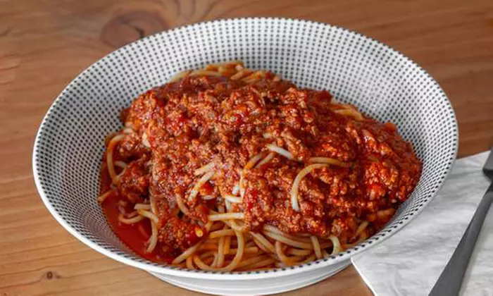 Savor Medium Pizzas or Pasta + Small Garlic Pizza