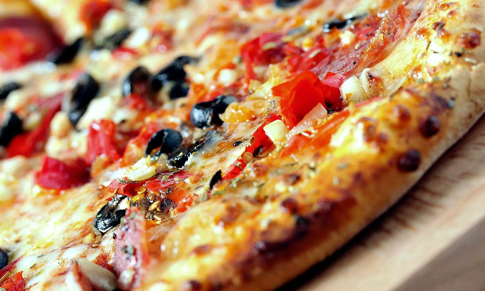 $18 for Three Groupons, Each Good for $10 Worth of Pizza at Tania's Pizza ($30 Total Value) - Primary Image