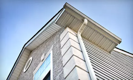 Up to 100 or 150 Linear Feet of Gutter Cleaning from Wojcik Window Washing (Up to 51% Off) - Primary Image