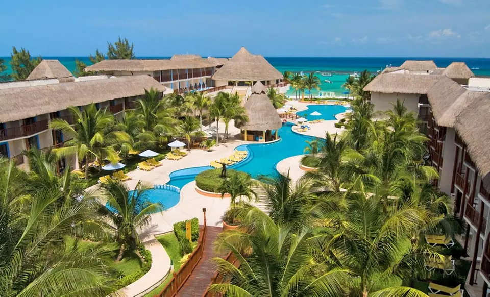 4- or 5-Night All-Inclusive Stay for Two at The Reef CocoBeach in Playa del Carmen. Includes All Taxes and Fees. - Primary Image