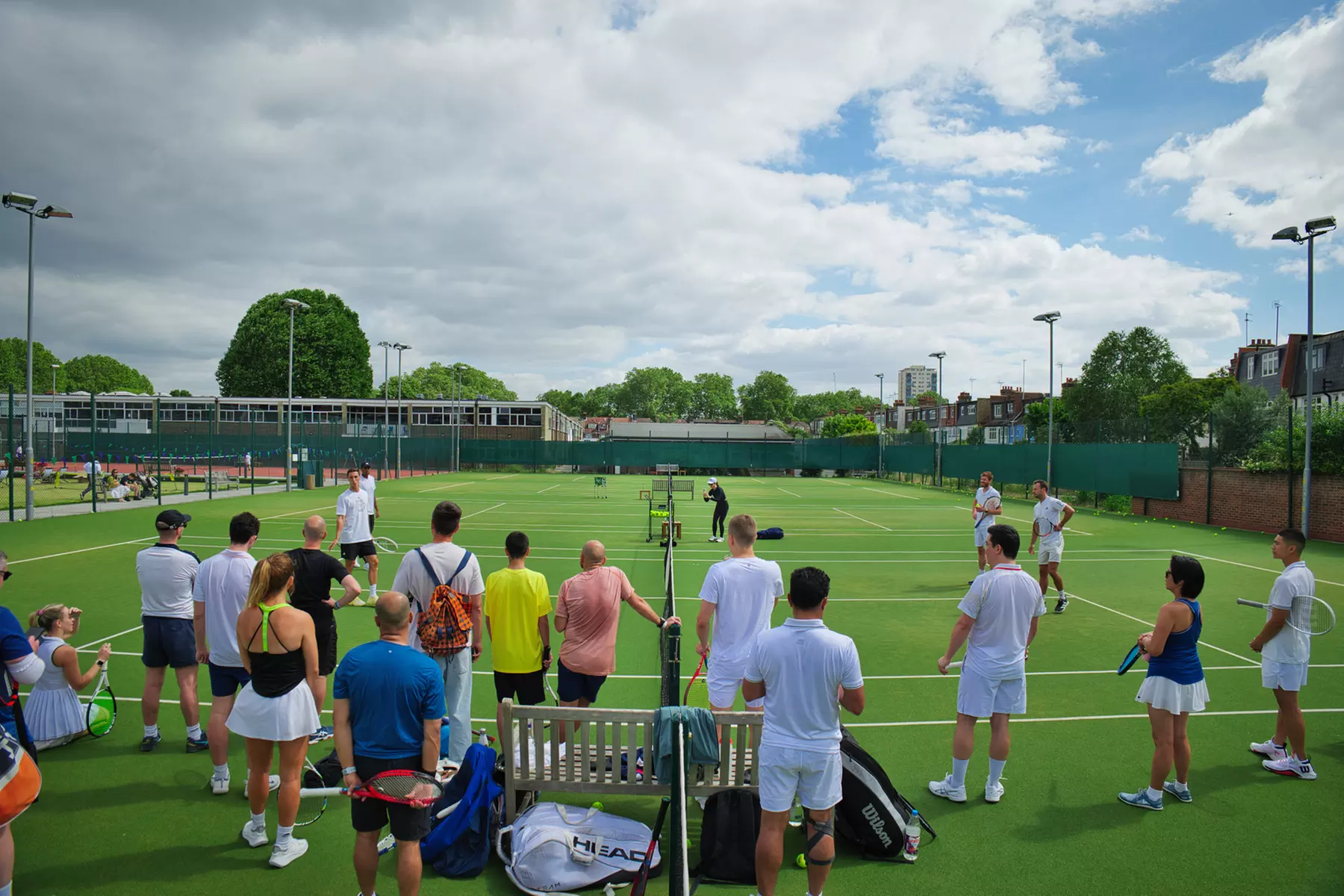 Elevate Your Tennis Skills: Play with a Pro Top 150 or 1500 Clinic