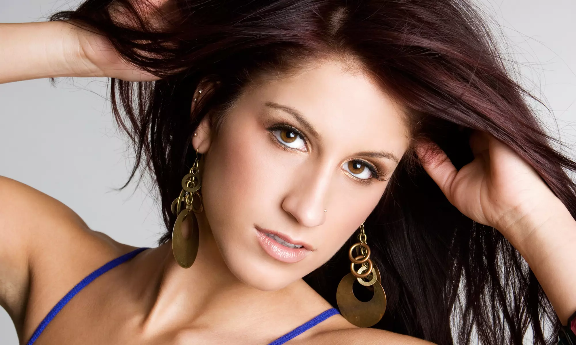 Haircut Package with Blow-Dry and Optional Color or Partial or Full Highlights at Sage Salon (Up to 55% Off) - Primary Image