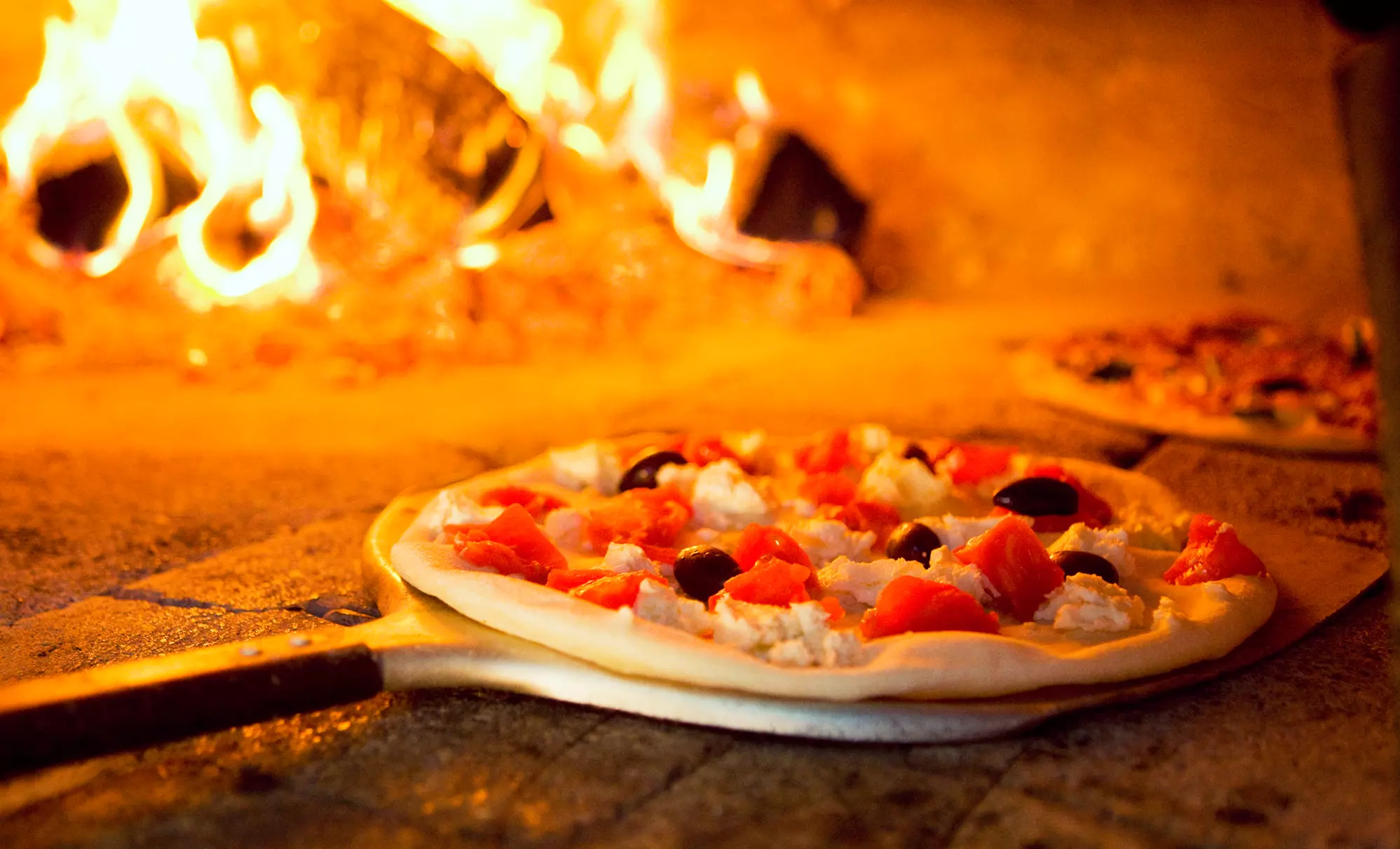 Brick Oven Pizza and Italian Food for Lunch or Dinner for Two at Goodfella's (Up to 37% Off) - Primary Image
