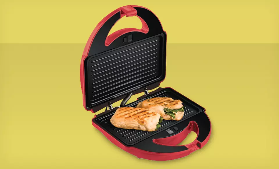 $39.99 for a Big Boss 7-Piece Grill in Purple or Red with Removable Cooking Plates ($59.99 List Price). Free Shipping. - Second Medium