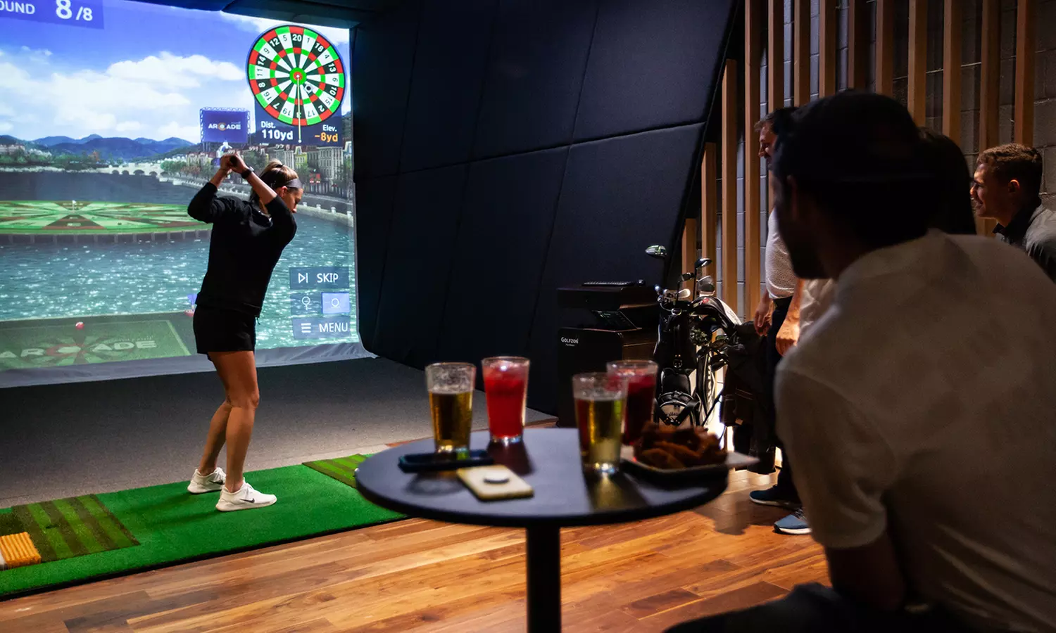 2hr Golf Simulator Rental with Pizza and Soda for 6 or 12 People at Game Of Irons (Up to 31% Off) - Primary Image