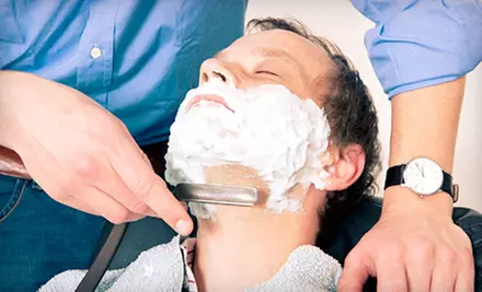 One or Two Onsite Men’s Haircuts with Optional Shaves from The Barber On Wheels (Up to 63% Off)  - Primary Image