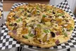 $25, $50, $75, or $100 Toward Food and Drink - Dine In or Carry Out at Pizza Twist (Up to 30% Off) - Second Medium