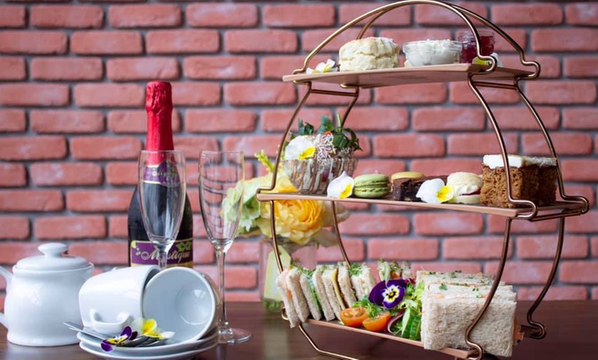 Image 1: Up to 23% Off on Afternoon Tea at Pirlos Dessert Lounge