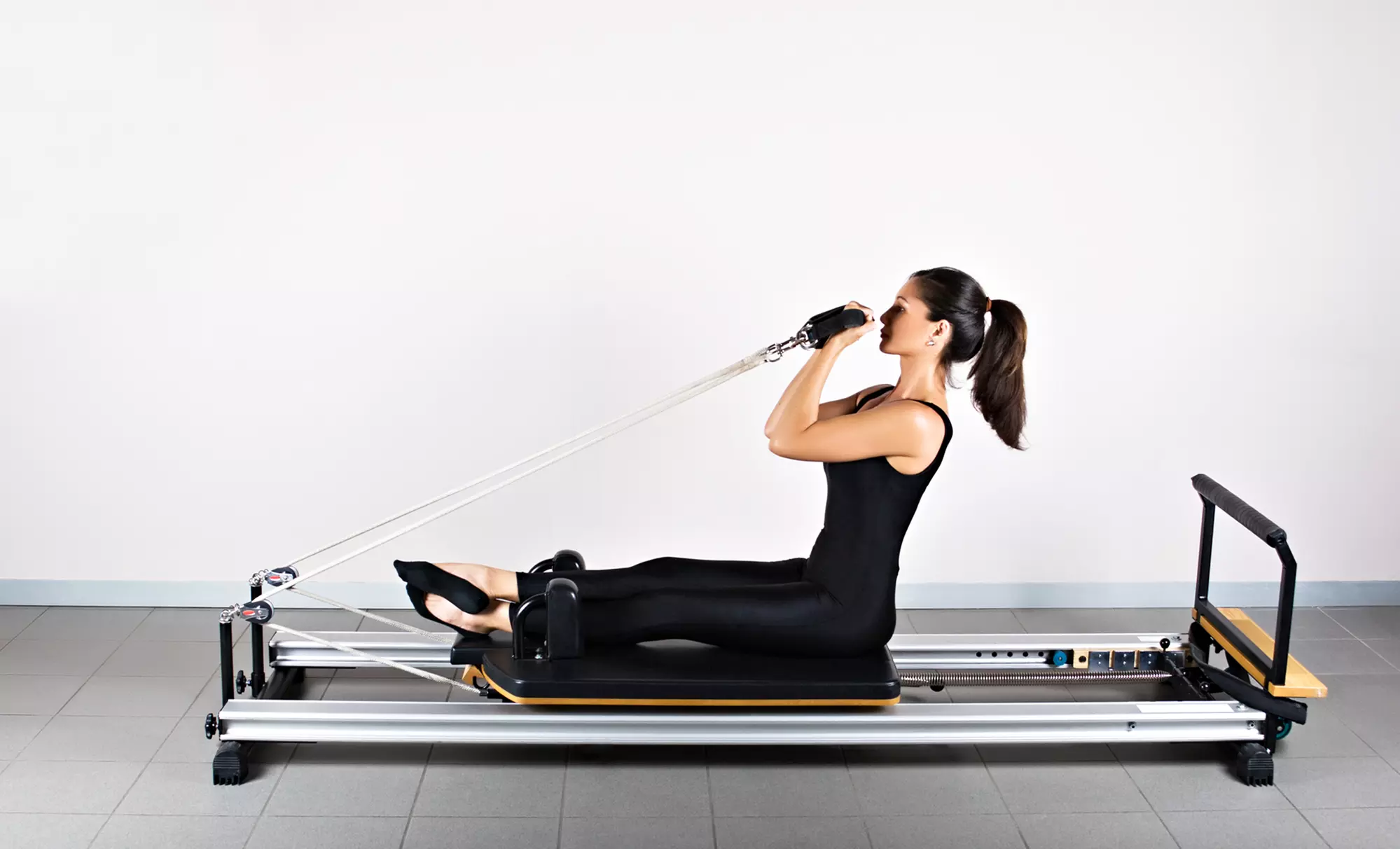Three Pilates Machine Classes or Six Pilates Mat Classes at Momentum Pilates (Up to 56% Off) - Primary Image