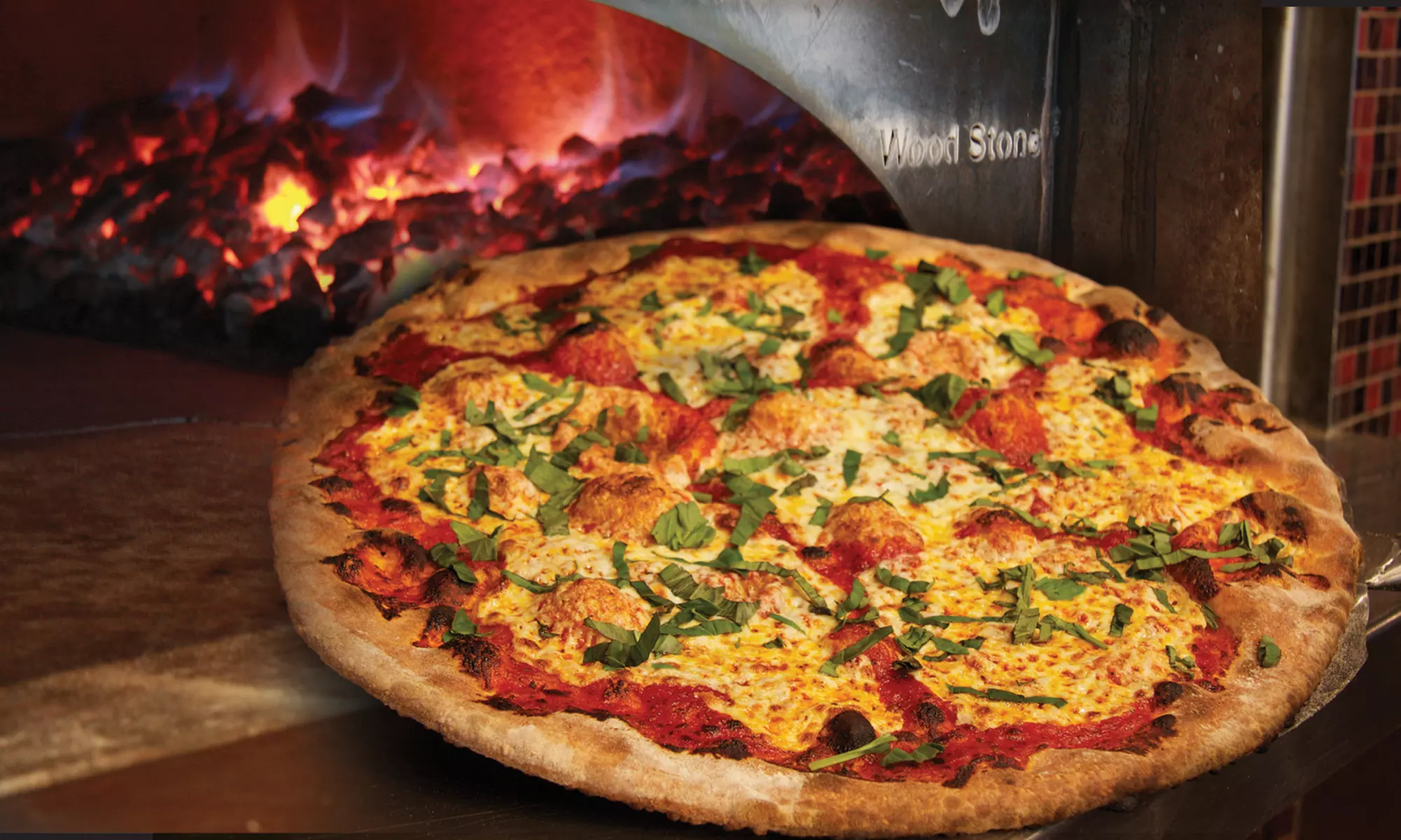 $13.50 for $20 Worth of Coal-Fired Pizza, Pasta, and Italian Fare (33% Off) - Primary Image