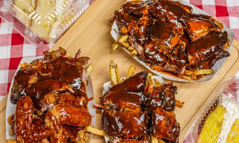Enjoy Jack's Chick'n Ribs BBQ experience with $100 or $50 options, featuring their signature rib tips, up to 18% off - Primary Image