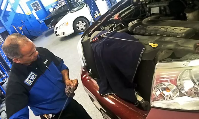 One or Three Oil Changes with Tire Rotation and 30-Point Inspections at Napa Auto Care Center (Up to 74% Off) - Primary Image
