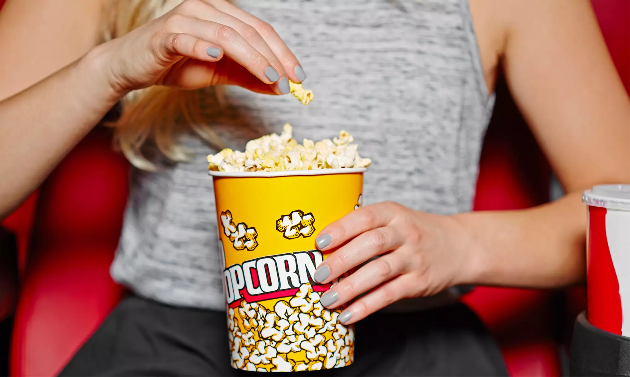 Experience Doc Popcorn's $10.00 Groupon with a range of popcorn flavors, up to 25% off for home enjoyment - Primary Image
