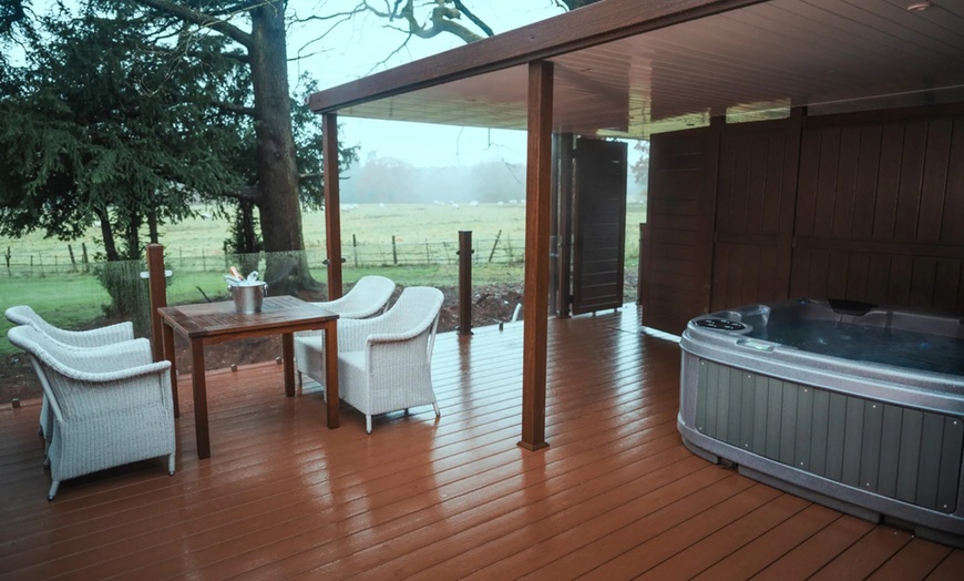 Image 2: Indulge in Tranquility: Relax and Unwind in a Hot Tub 