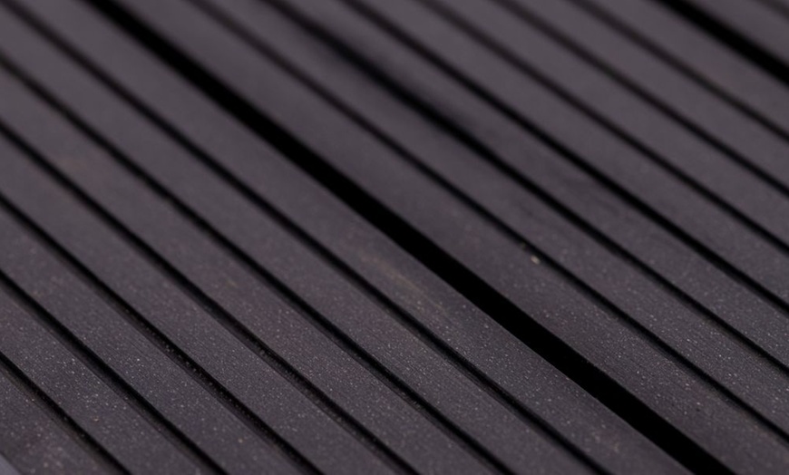 Image 6: Up to 50 Packs of Non-Slip Decking Tiles - Grey or Brown