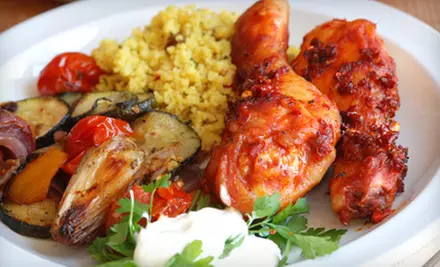 $15 for $30 Worth of West African Dinner Cuisine at Roger Miller Restaurant in Silver Spring - Primary Image