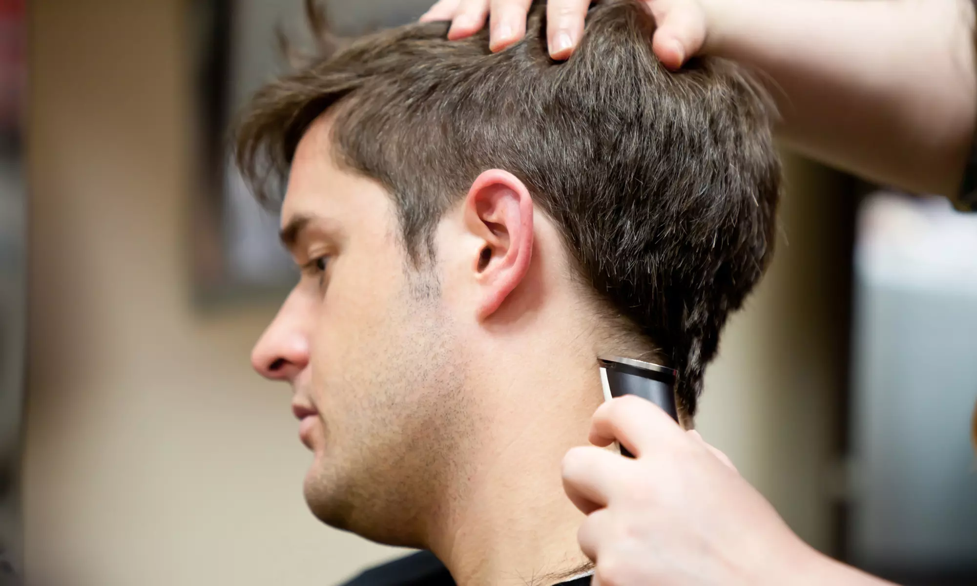 C$26.99 for a Men's Haircut with Deep Conditioning Treatment at Kenneth Michael Hair Studio (C$50 value) - Primary Image