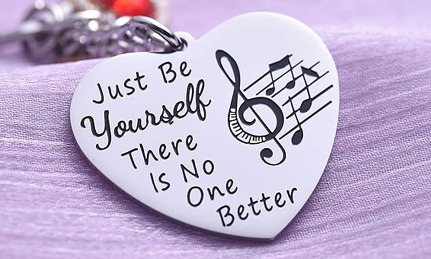 Image 1: 2 Pack Taylor Quotes Music Lover Keychains