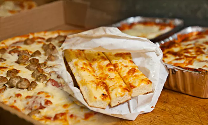 C$16.50 for C$30 Worth of Pizza, Wings, and Pasta at Chris's 2 for 1 Pizza - Primary Image