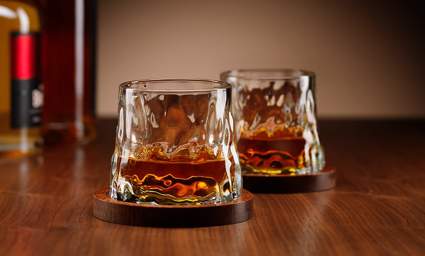 Image 1: Set of Two Rotating Whisky Glasses with Coasters