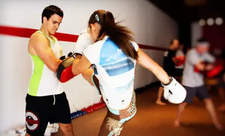 10 Muay Thai Kickboxing Classes or 12 Classes and a Personal-Training Session at UMTBC Lifestyle Center (Up to 81% Off) - Primary Image