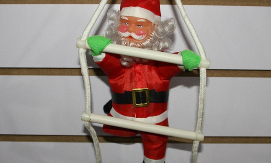 Image 4: Climbing Santa Decoration