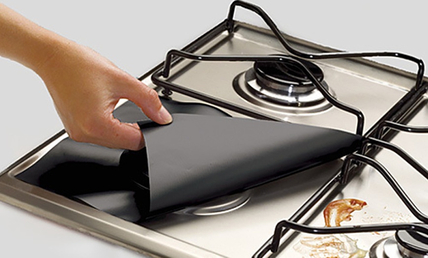 Image 5: Non-Stick Stove Hob Protector Set