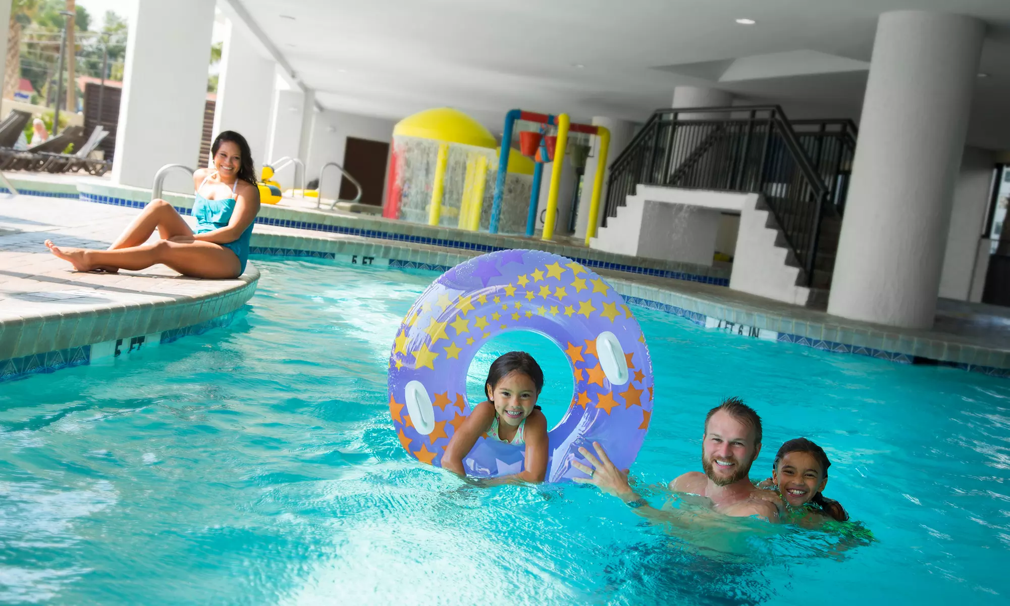 Family fun awaits at Ocean Reef Resort—pools, slides & ocean views!