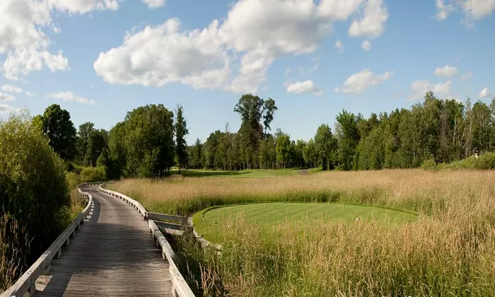 18-Hole Round of Golf for 2 or 4 & Cart Rental at The Refuge Golf Club